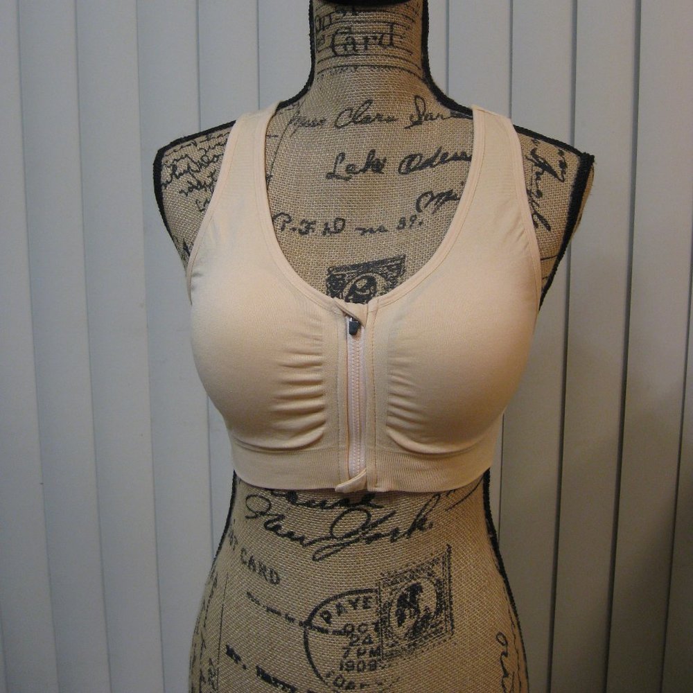 NWOT nude zip front sports bra M med